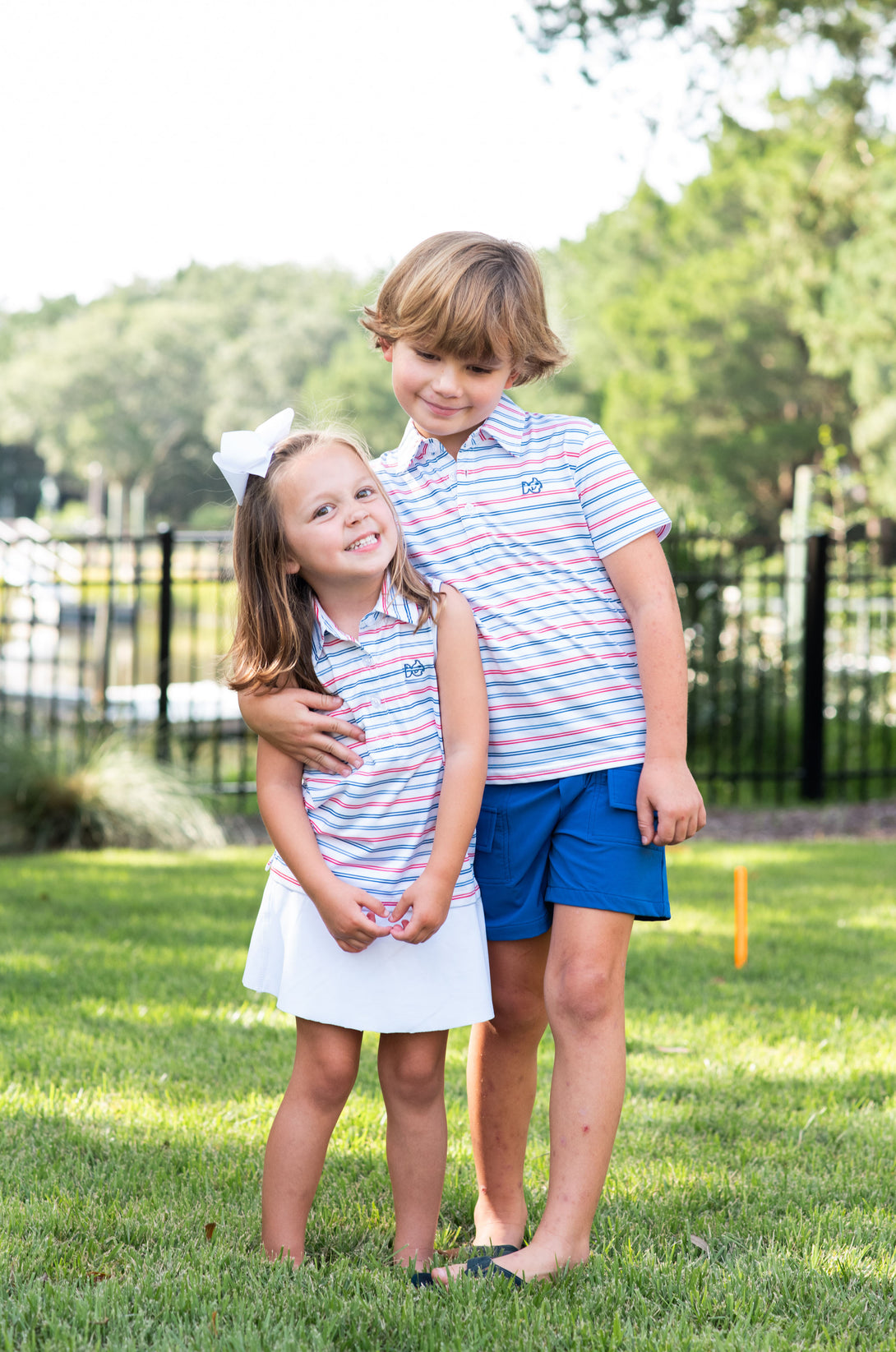 Sleeveless Pro Performance Polo in USA Stripe Girl